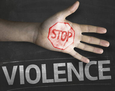 Educational and Creative composition with the message Stop Violence on the blackboard